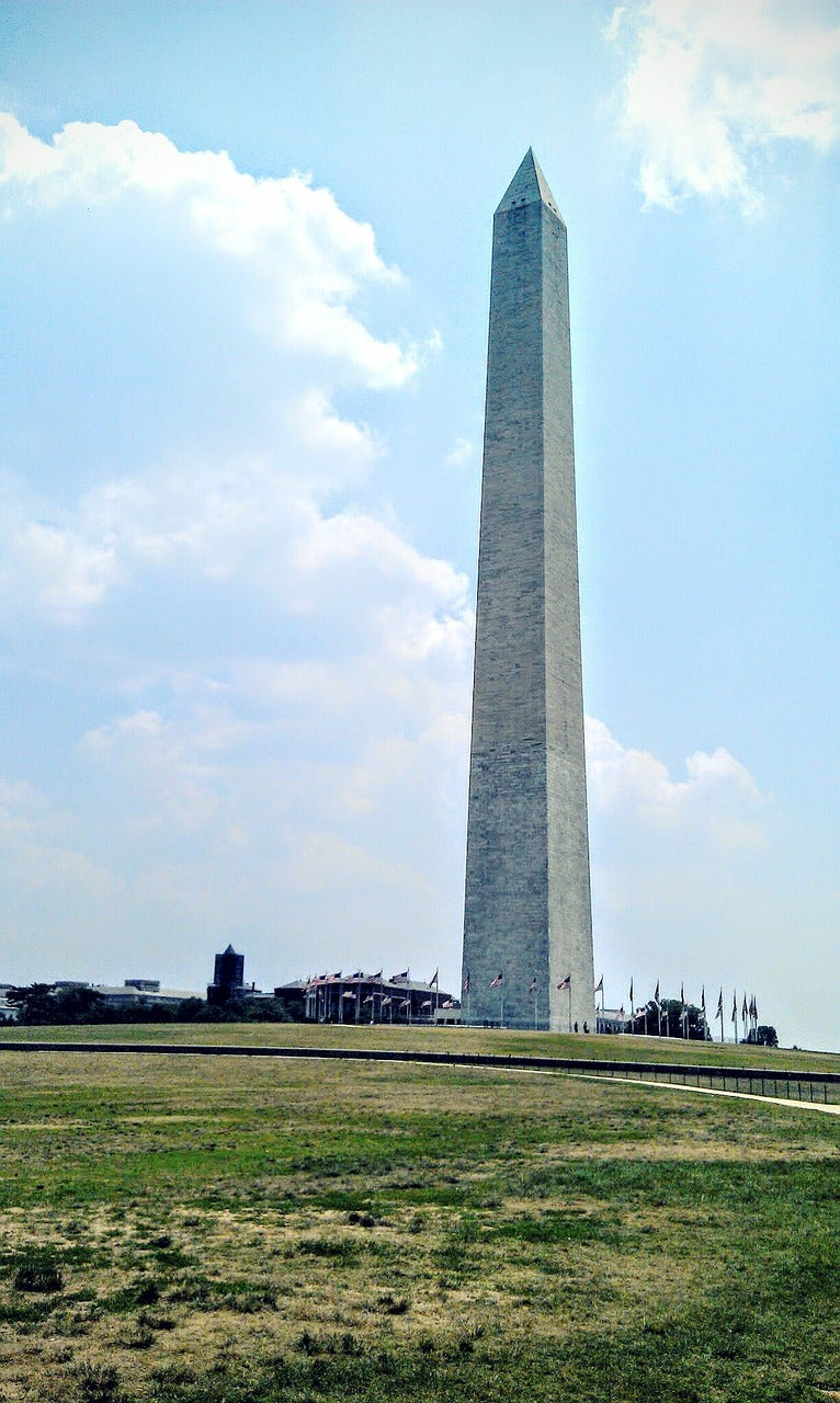 american flags, clouds, grass-1836231.jpg