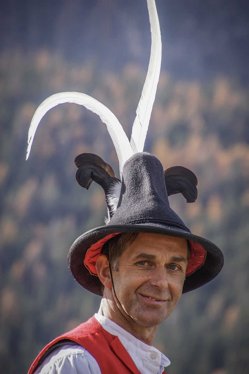 man, feathers, hat-3794795.jpg